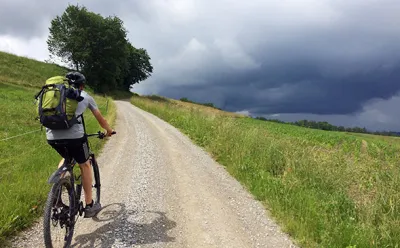 Cycling into rain clouds